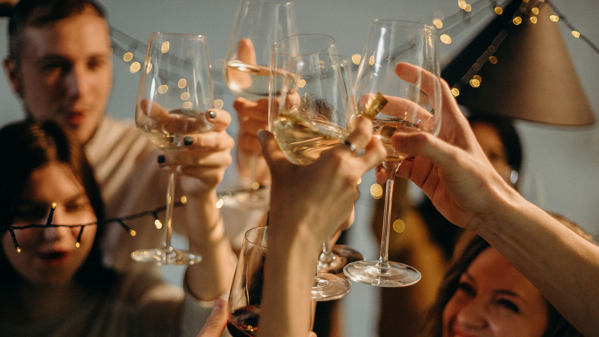 Friends celebrating with wine