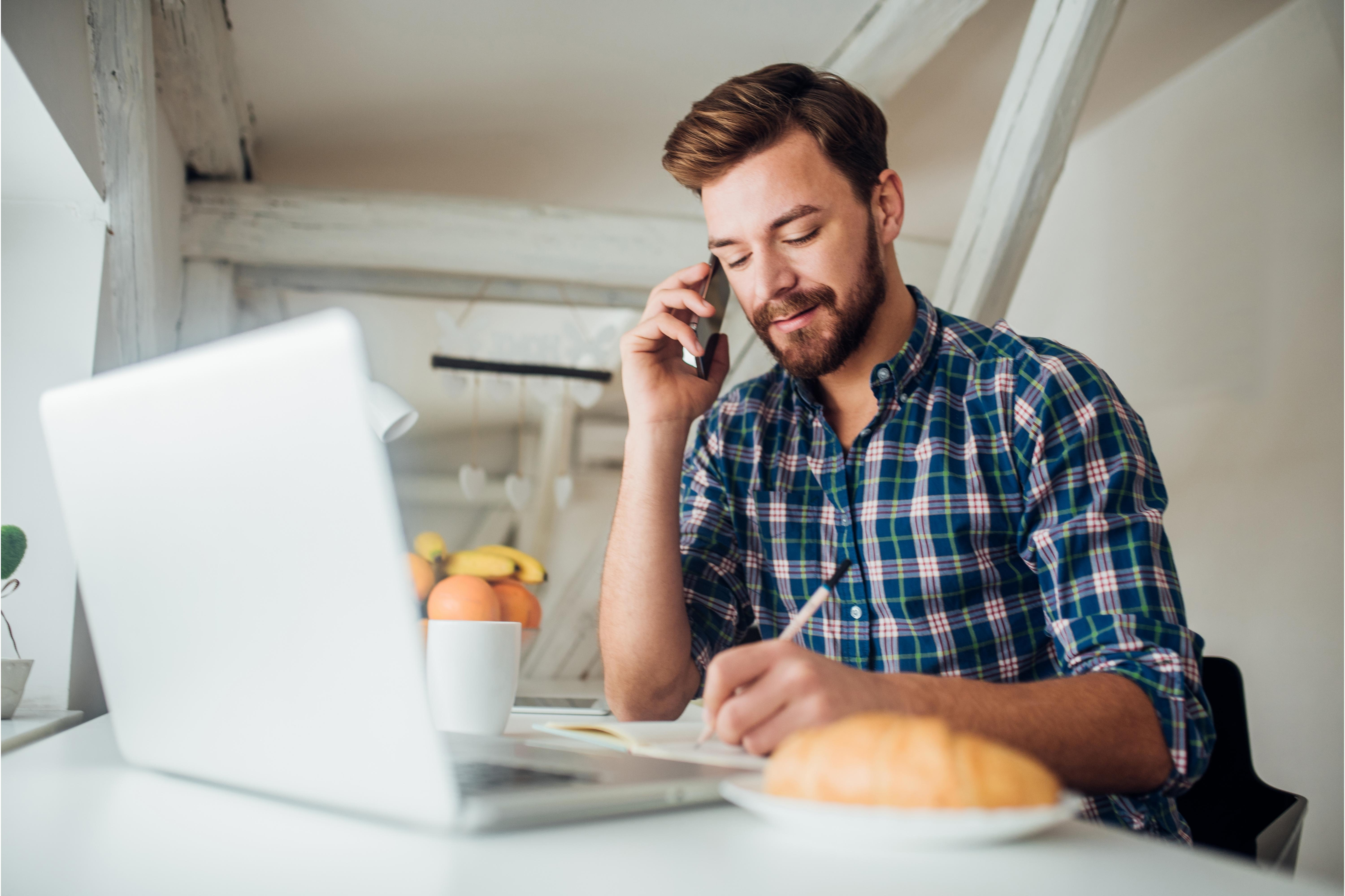 Man on the phone, working from home